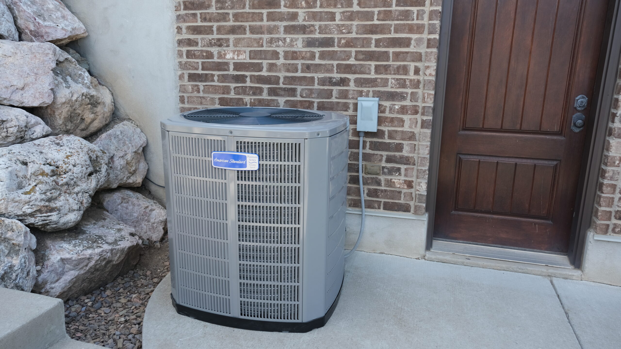 Air conditioner installation by Brigham Heating and Cooling
